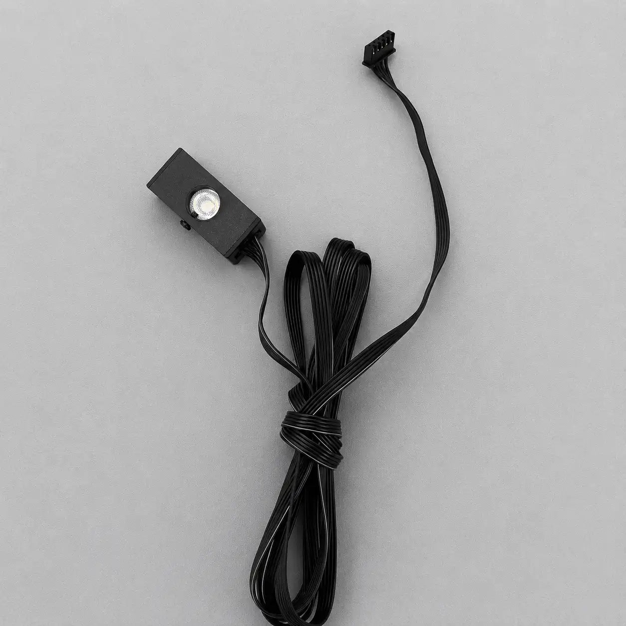 Single meteor light module for an automotive fiber optic star ceiling lighting kit with plug-and-play connector for dynamic shooting star effects.