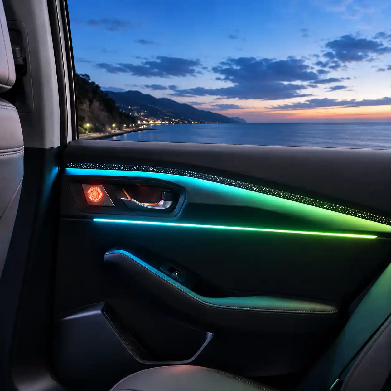 Automotive panel ambient light installed on a car door trim, creating a premium interior atmosphere during a coastal blue hour drive.