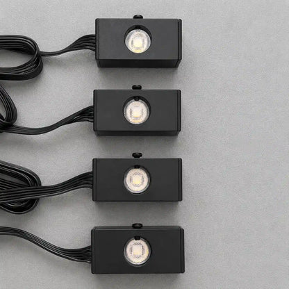 Close-up of four meteor light modules for an automotive fiber optic star ceiling lighting kit, designed to create dynamic shooting star effects.