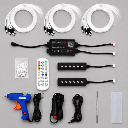 Complete automotive star light fiber optic ambient lighting kit with controller, RGB remote, fiber strands, and installation tools for OEM and customization projects.